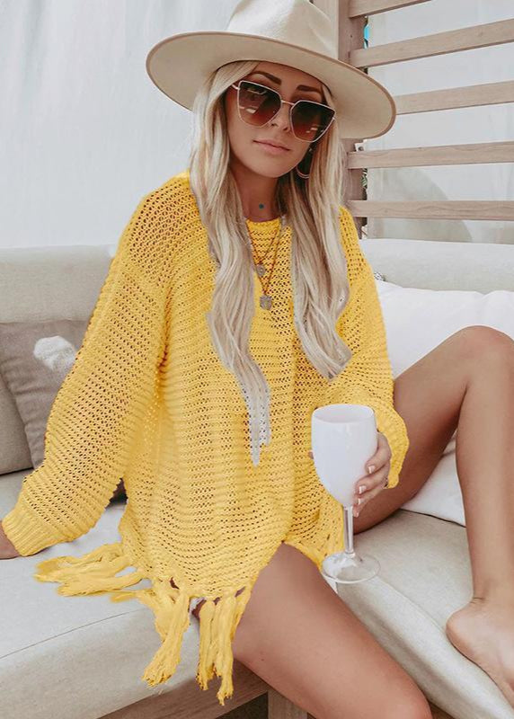 Poncho de plage en maille ajourée à franges
