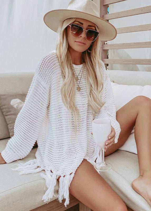 Poncho de plage en maille ajourée à franges